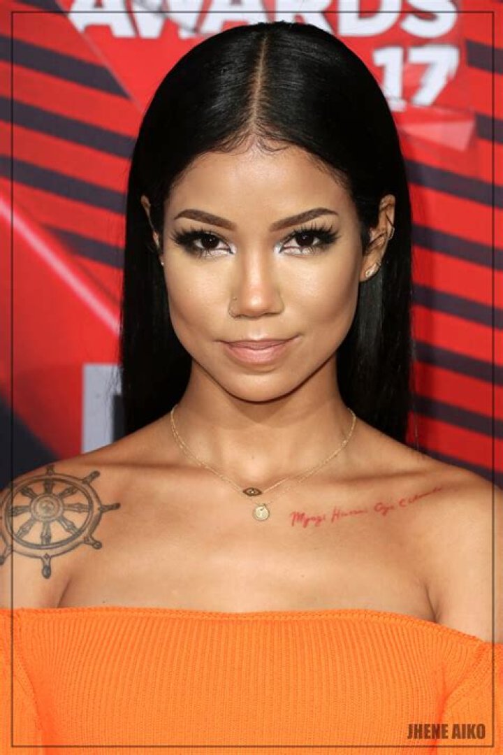 Exploring The Meaning Behind Jhene Aiko's Tattoos